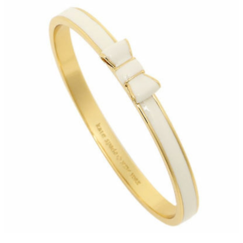 Kate Spade Take a Bow Bangle in Natural and Gold